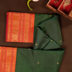 Bottle Green Kanchipuram Silk Saree with Contrast Orange Korvai Border & Diagonal Zari Pallu