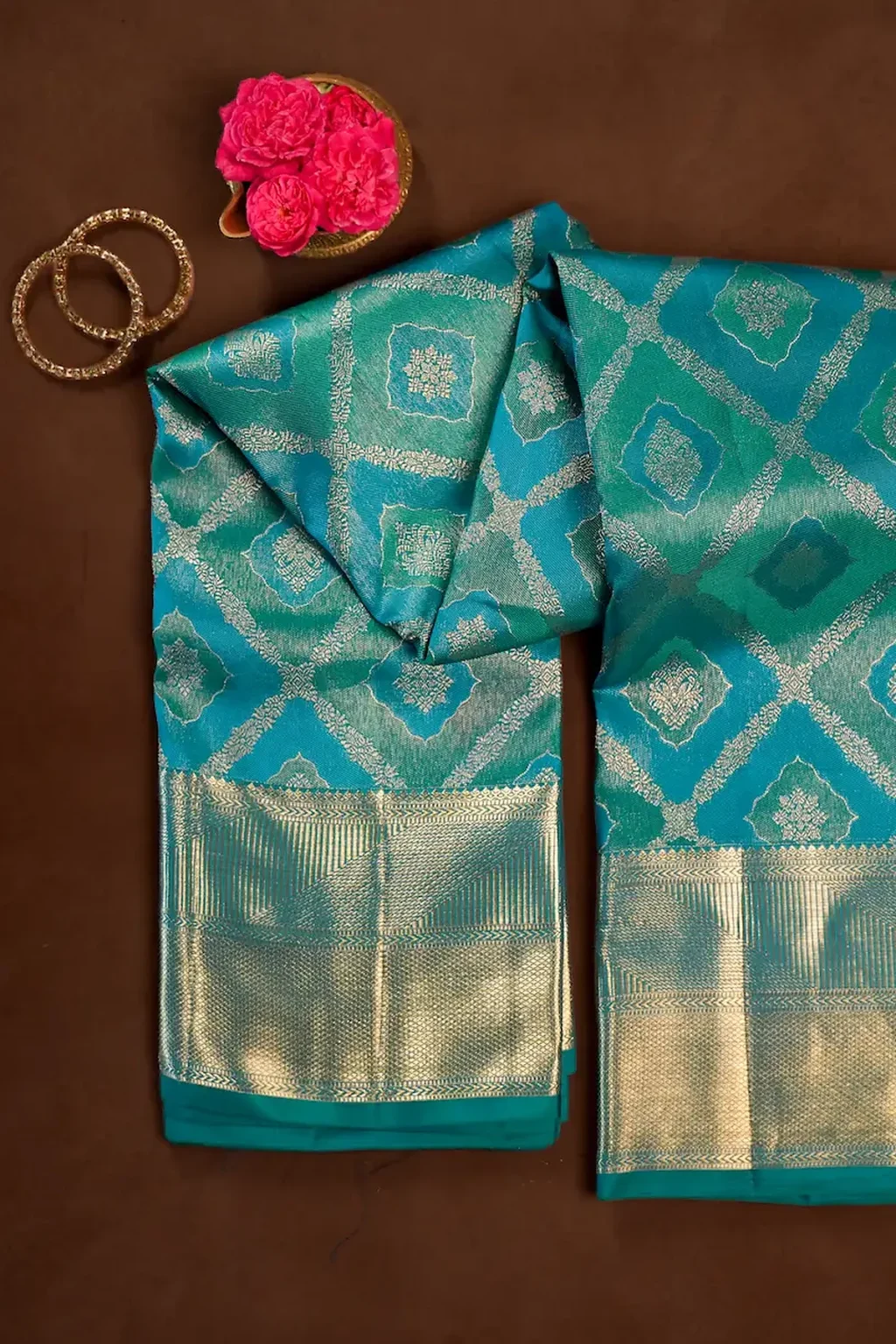 Teal Green Kanchipuram Silk Saree with Dual-Tone Floral Motifs & Grand Gold Zari Border