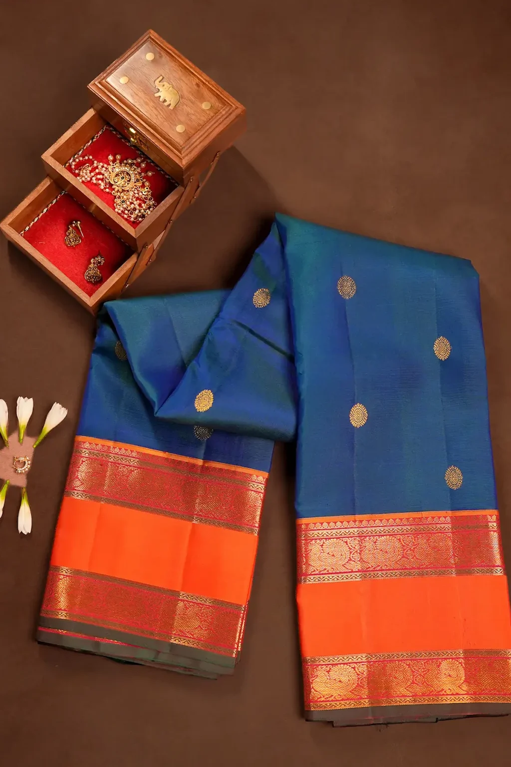 Royal Blue Kanchipuram Silk Saree with Zari Buttas, Orange Rettai Pettu Border & Red Brocade Pallu