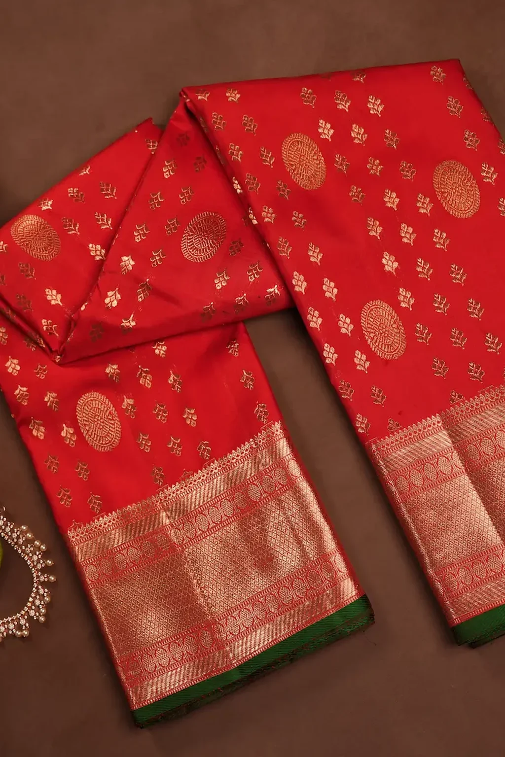 Red Kanchipuram Silk Saree with All-Over Zari Buttas, Wide Gold Zari Border & Green Edge