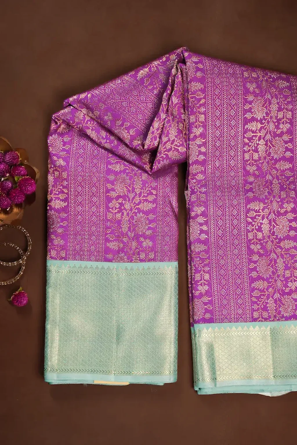 Purple Kanchipuram Silk Saree with All-Over Zari Florals & Grand Pastel Blue Brocade Pallu